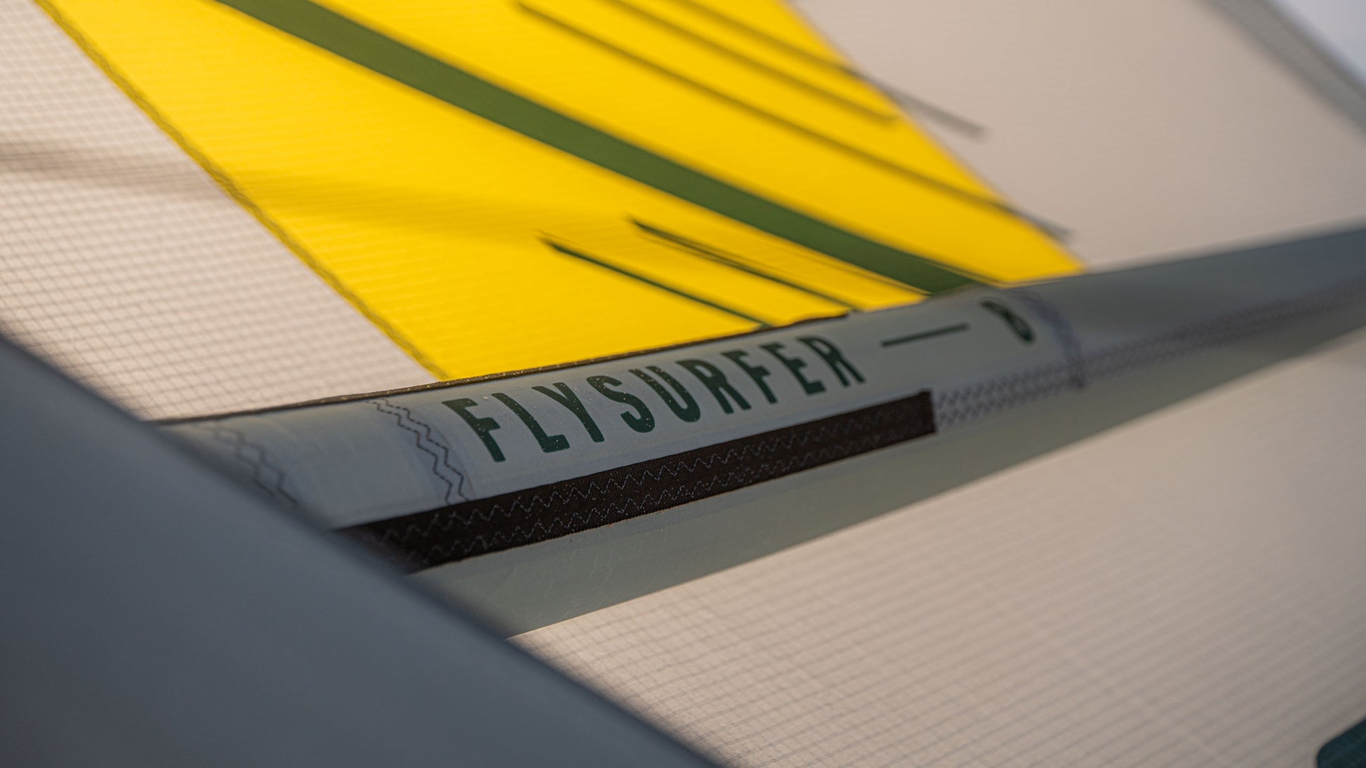 Close up picture of a Flysurfer ERA kiteboarding kite with proven premium materials like Dacron and Teijin D2. Fewer panels for improved weight and airflow. Built for maximum stress